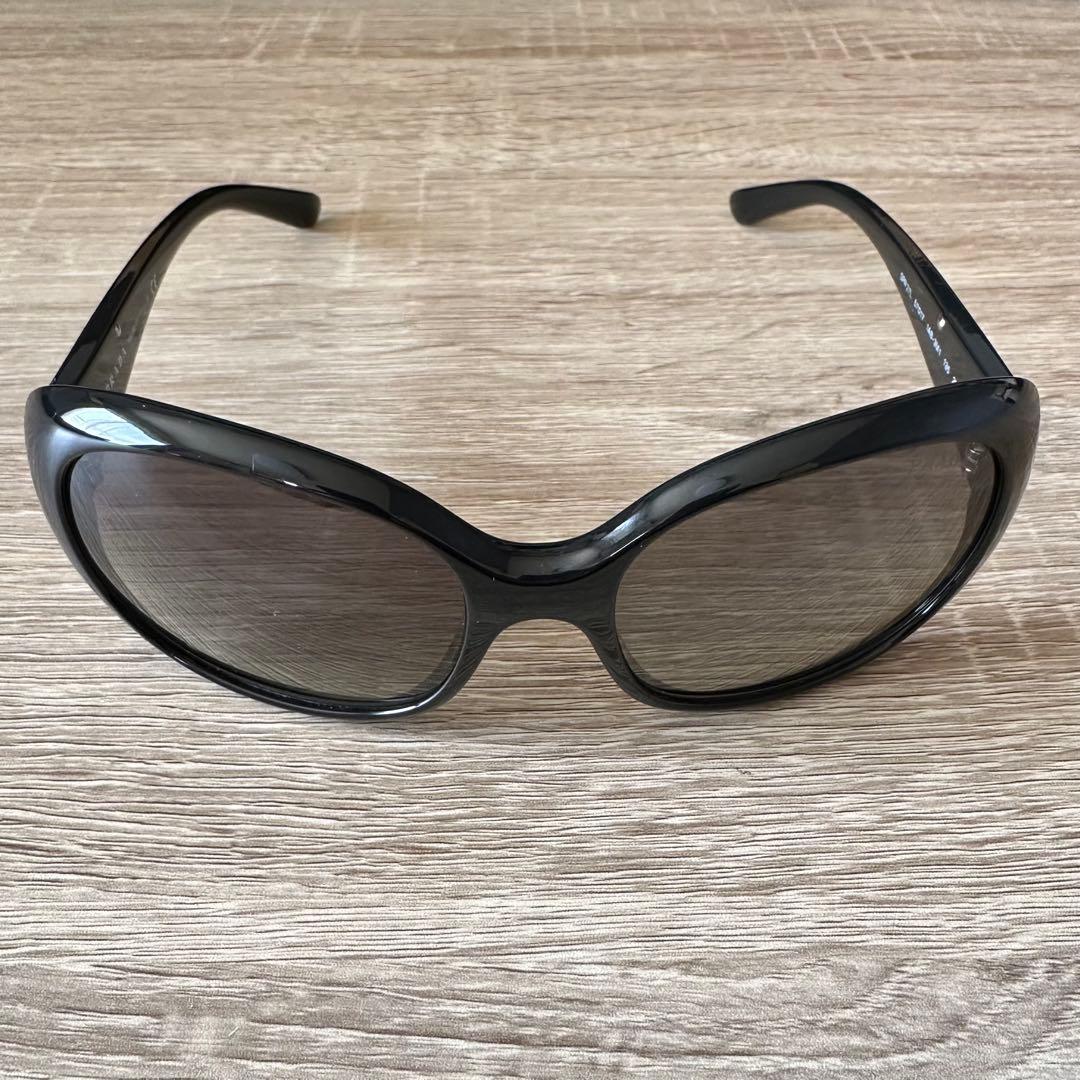 PRADA SPR 27L ブラックレディースサングラス 57◻︎17-135