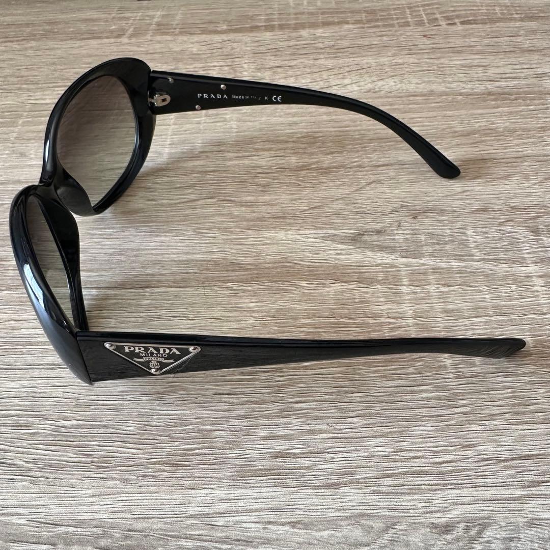 PRADA SPR 27L ブラックレディースサングラス 57◻︎17-135