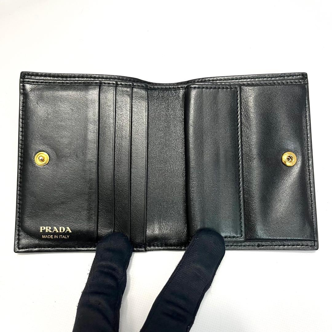 希少✨プラダ 二つ折り財布 花柄 総柄 ロゴ金具 レザー マルチカラー