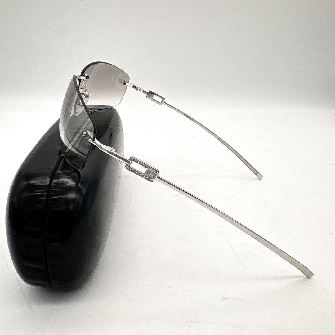 小物 GUCCI sunglasses rimless stone silver