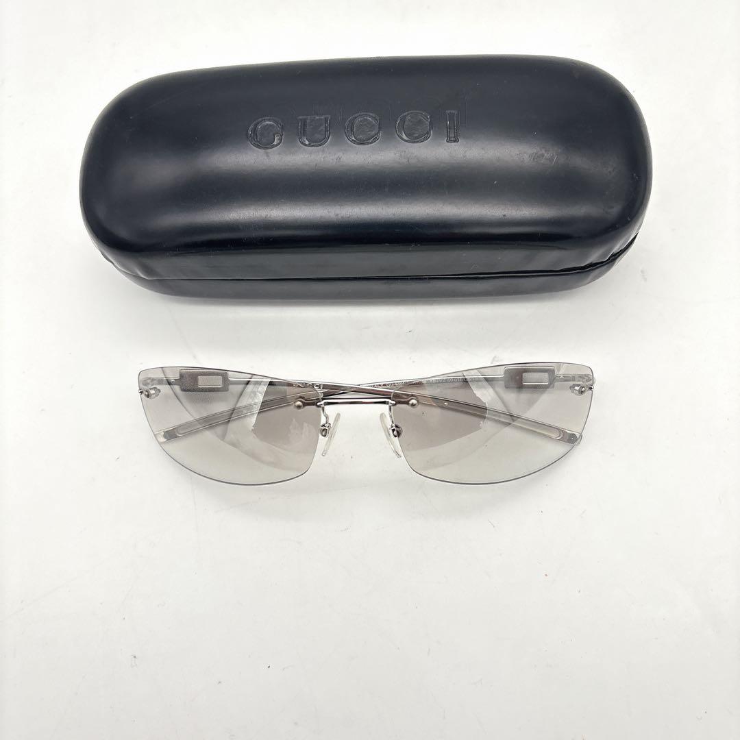 小物 GUCCI sunglasses rimless stone silver