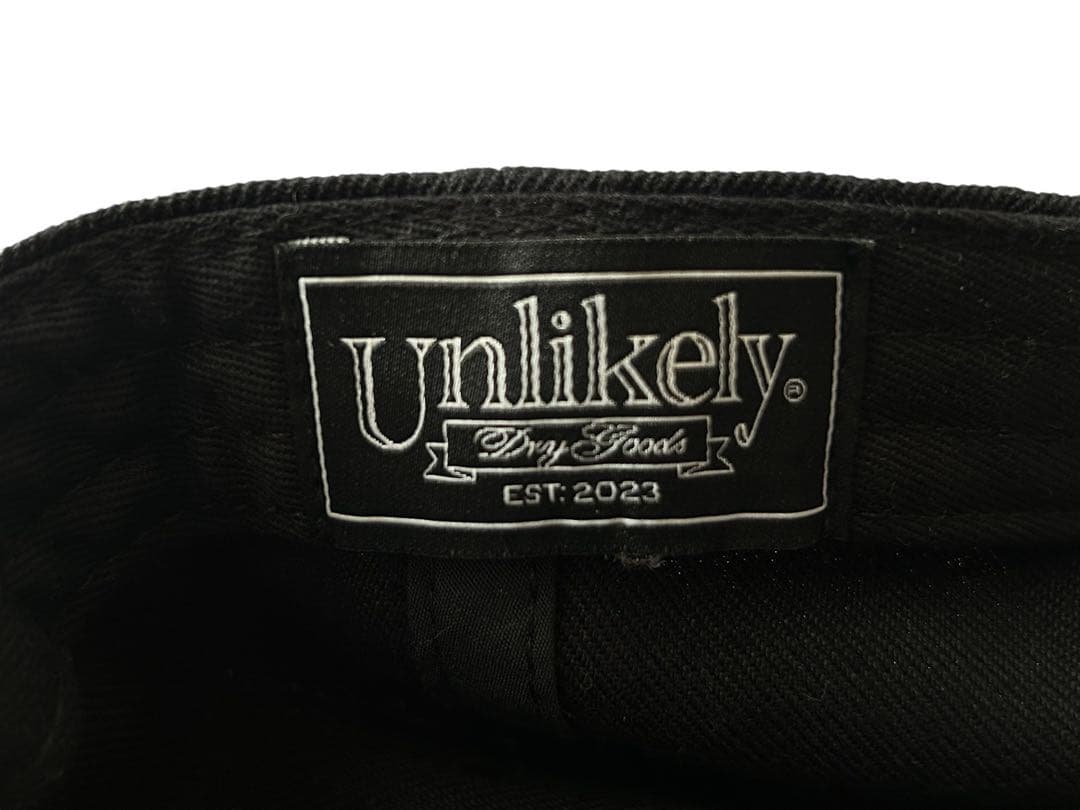 NEPENTHES × Unlikely キャップ ブラック